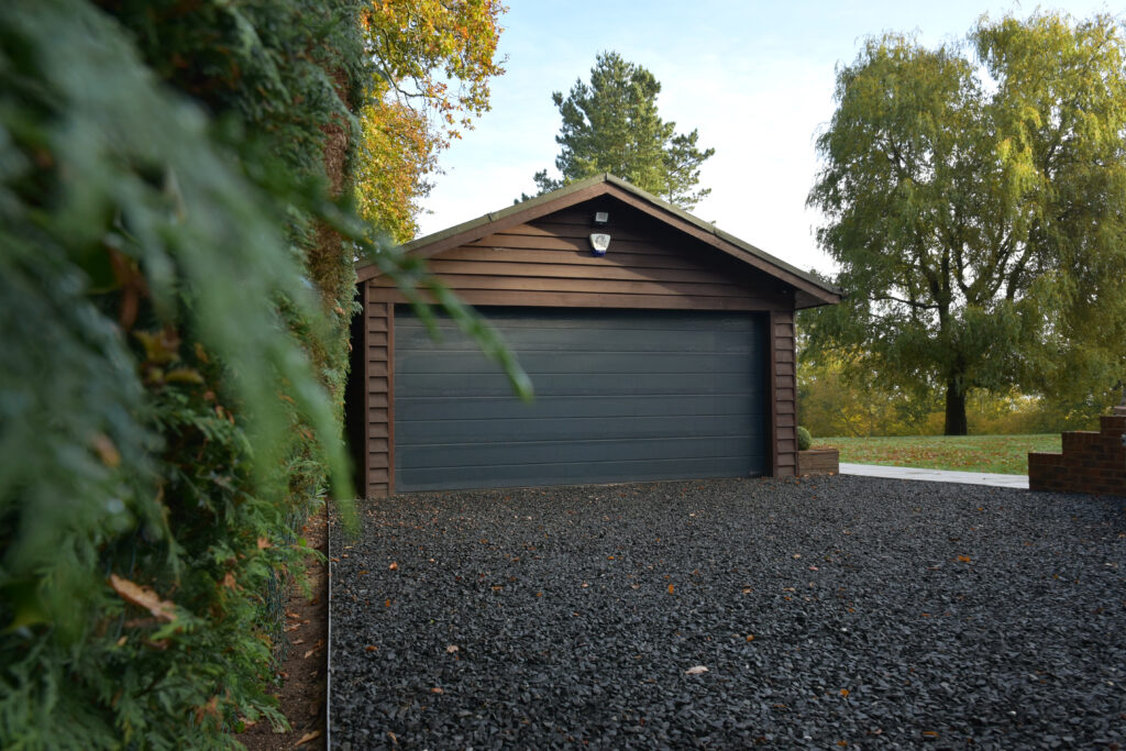 A comparison of popular gravel driveway edging materials used to improve appearance and help contain loose gravel.